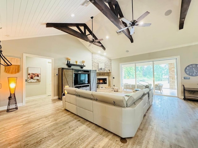 living room with high vaulted ceiling, light wood-type flooring, and ceiling fan