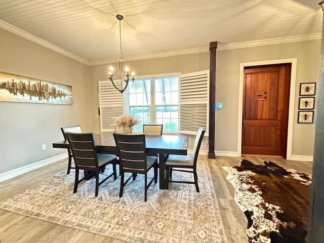 dining space with crown molding and wood-type flooring