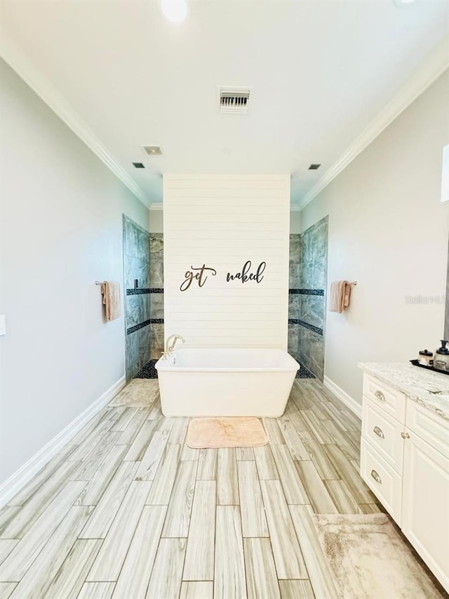 bathroom featuring vanity, crown molding, independent shower and bath, and hardwood / wood-style floors