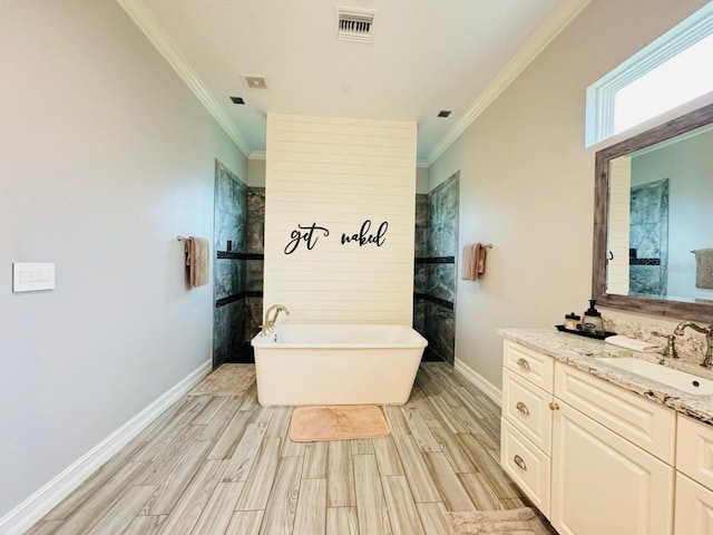 bathroom featuring vanity, ornamental molding, wood-type flooring, and shower with separate bathtub