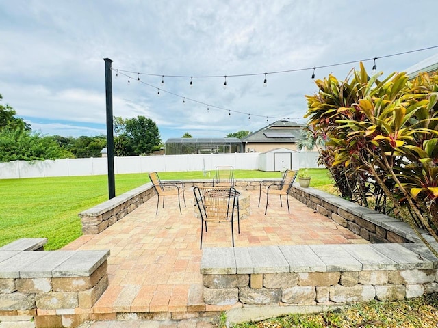 view of patio featuring a shed