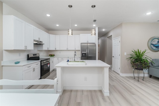 kitchen with sink, hanging light fixtures, light hardwood / wood-style floors, stainless steel appliances, and white cabinets