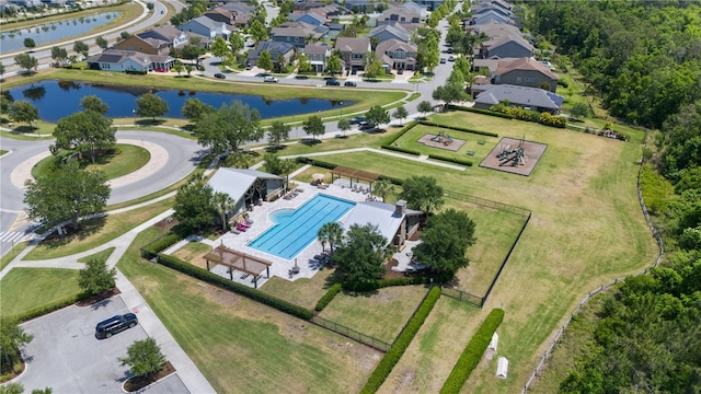 bird's eye view with a water view