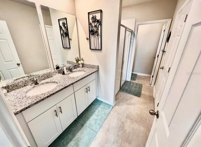 bathroom featuring vanity and walk in shower