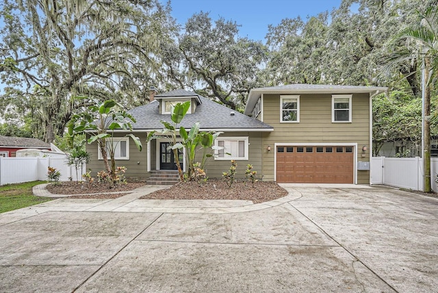 734 S Mills Ave, Orlando, FL 32801 - view of front facade with driveway, a gate, a garage, fence, and a shingled roof