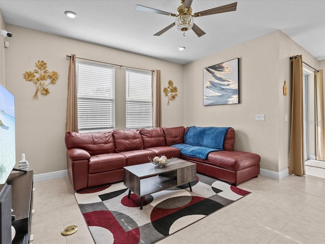528 Bellissimo Pl, Howey In The Hills, FL 34737 - living area with ceiling fan, baseboards, and light tile patterned floors