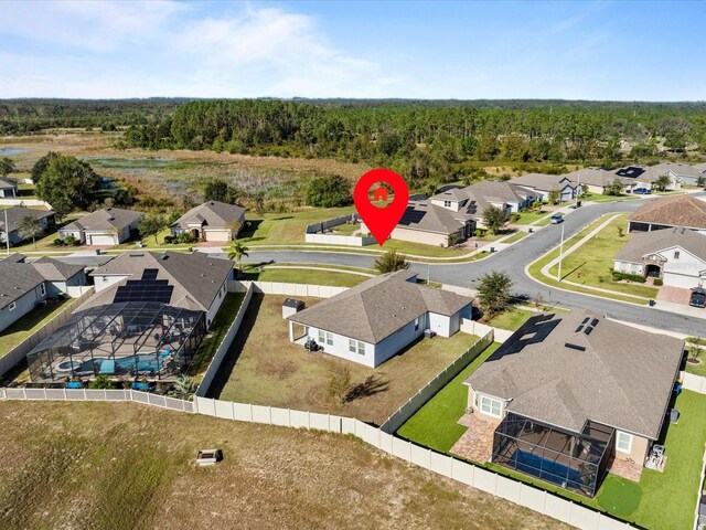 528 Bellissimo Pl, Howey In The Hills, FL 34737 - birds eye view of property with a forest view and a residential view