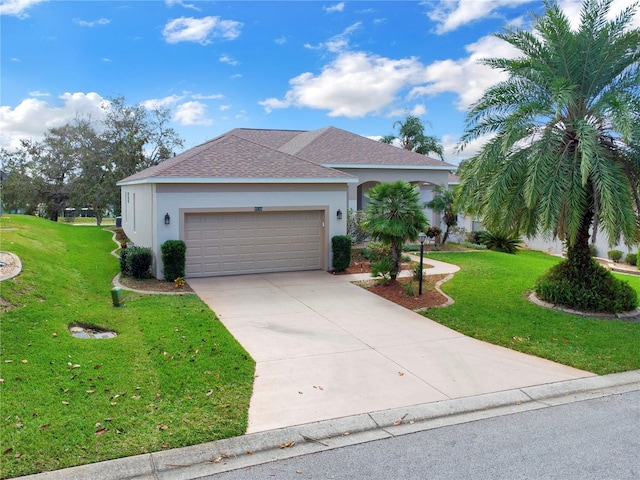 ranch-style house with a garage and a front lawn