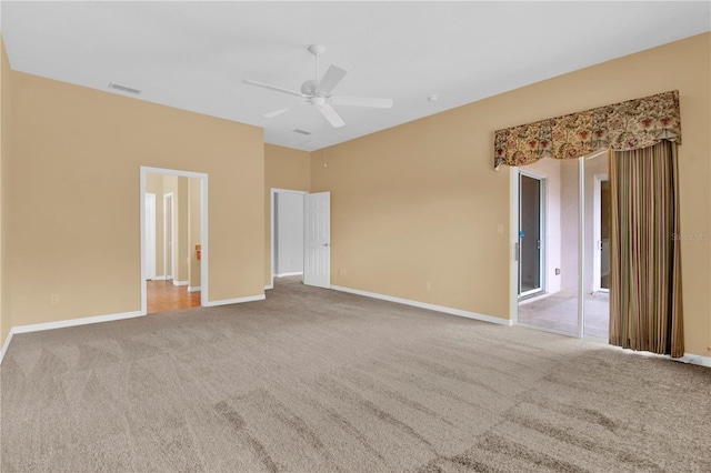 4538 Nottoway Dr, Leesburg, FL 34748 - unfurnished room featuring a ceiling fan, baseboards, visible vents, and carpet