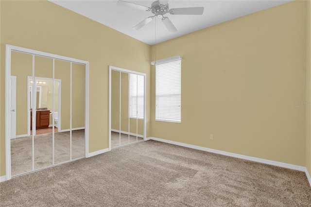 unfurnished bedroom with ceiling fan and light carpet