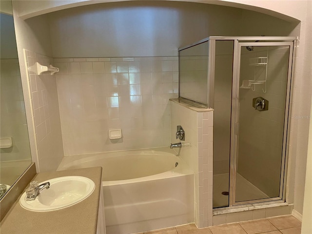 bathroom with vanity, tile patterned floors, and independent shower and bath