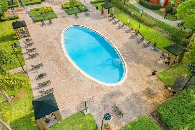 view of swimming pool featuring a gazebo and a patio area