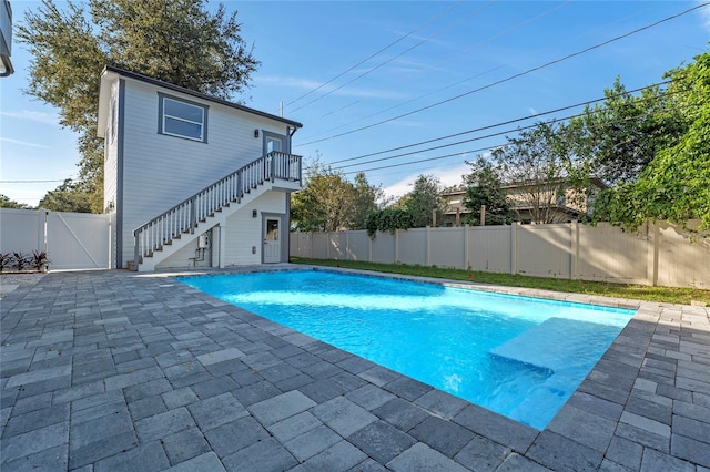 view of pool featuring a patio