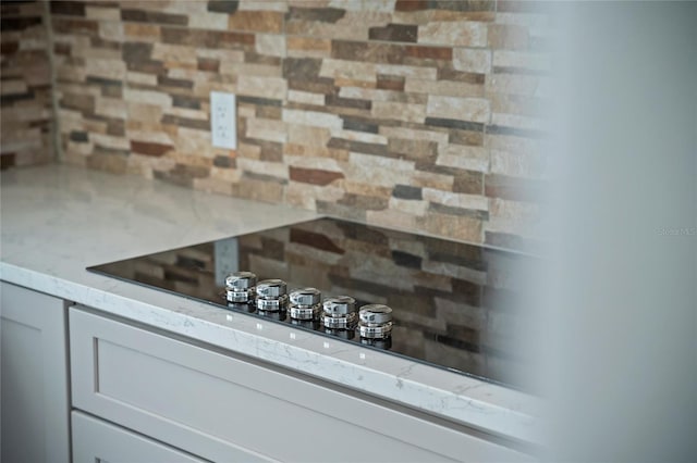 interior details featuring light stone countertops