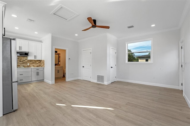 unfurnished living room with ceiling fan, light hardwood / wood-style flooring, and ornamental molding