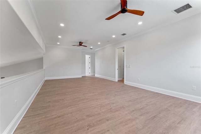 unfurnished room featuring light hardwood / wood-style flooring, ceiling fan, and crown molding