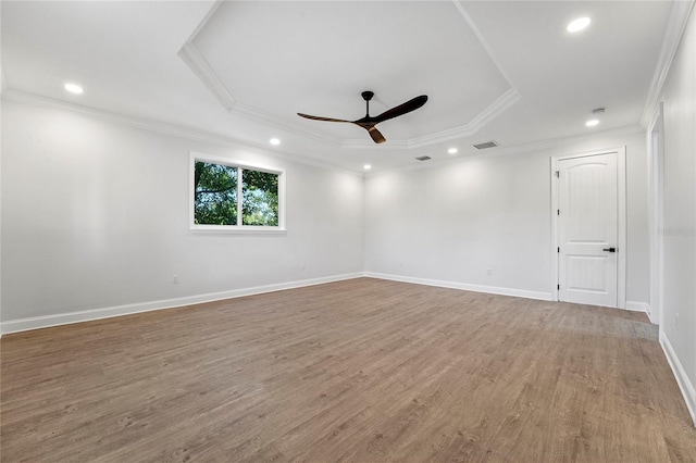 unfurnished room featuring light hardwood / wood-style floors, ceiling fan, and ornamental molding