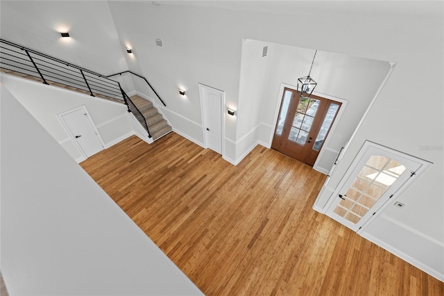 entrance foyer with light hardwood / wood-style flooring