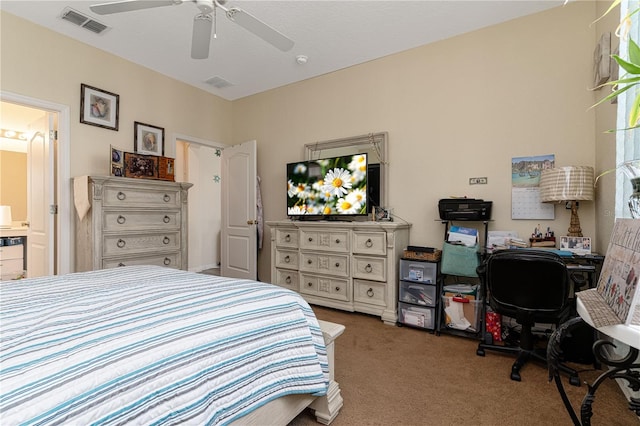 bedroom featuring ceiling fan, carpet flooring, and ensuite bath