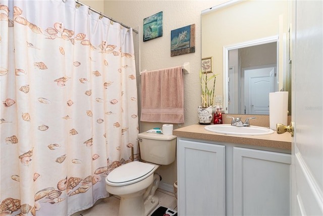 bathroom featuring vanity, a shower with curtain, and toilet