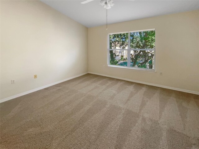 1711 Shadow View Cir Unit 1711, Maitland, FL 32751 - empty room featuring a ceiling fan, baseboards, and carpet