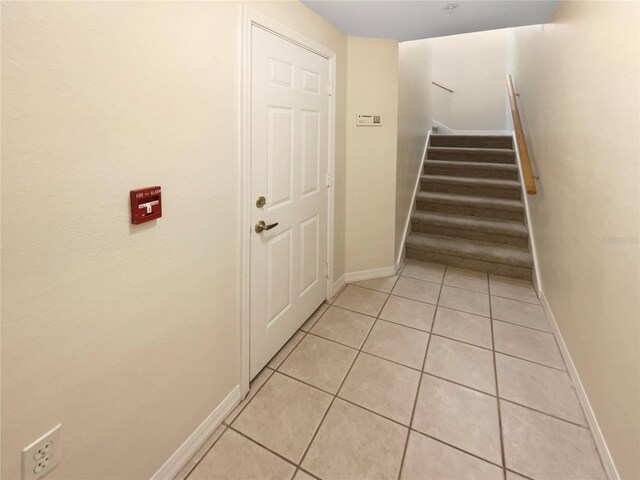 1711 Shadow View Cir Unit 1711, Maitland, FL 32751 - staircase with baseboards and tile patterned floors