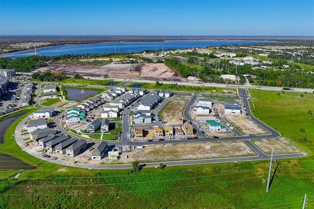 drone / aerial view with a water view