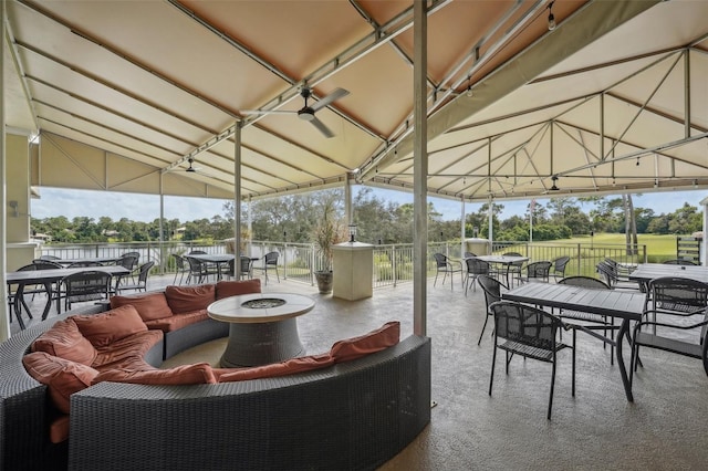 view of patio / terrace featuring an outdoor living space with a fire pit