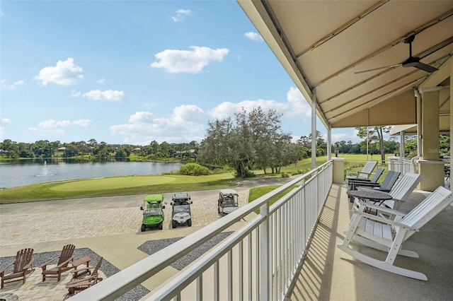 balcony featuring a water view