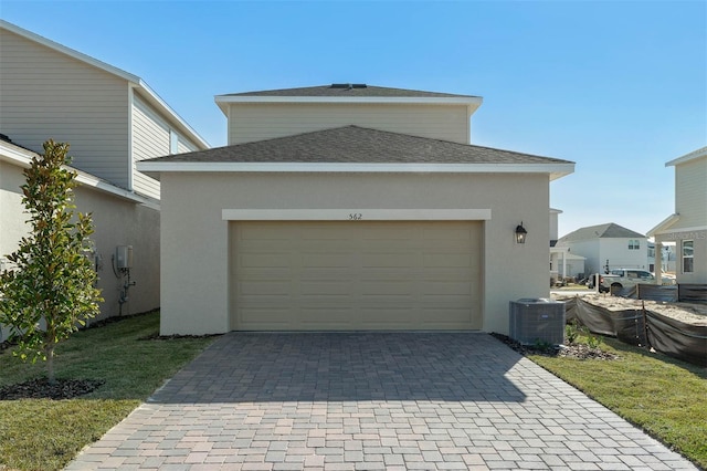 garage with central AC unit