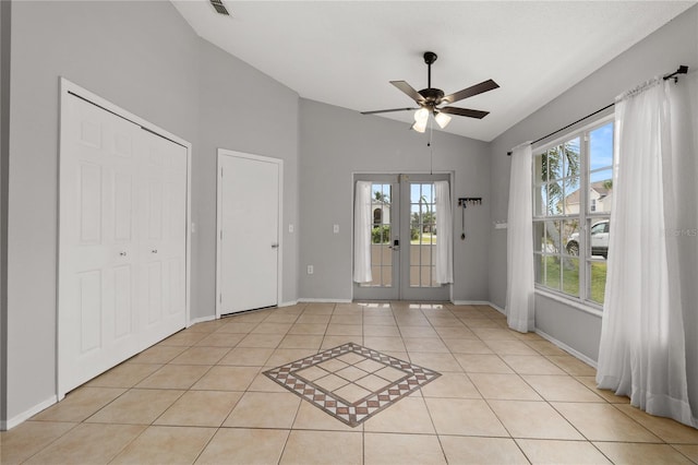 interior space featuring french doors, ceiling fan, and lofted ceiling