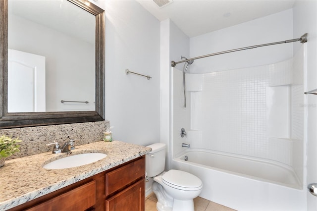 full bathroom with tile patterned flooring, vanity, tub / shower combination, and toilet