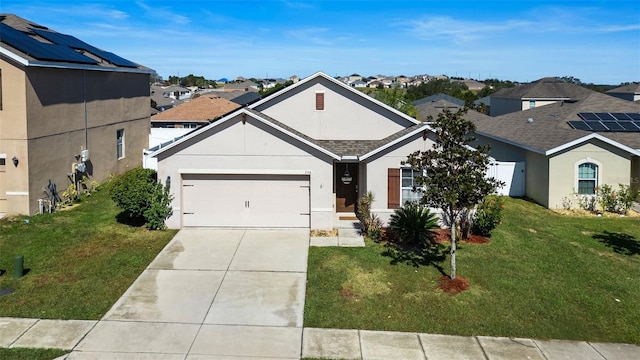 single story home featuring a garage and a front lawn