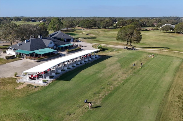 birds eye view of property with view of golf course