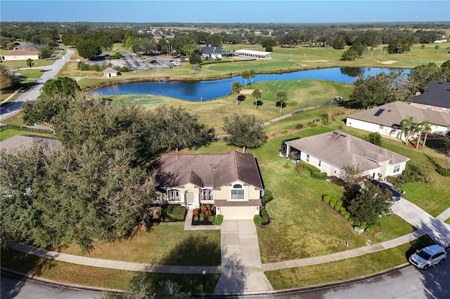 drone / aerial view with a residential view and a water view