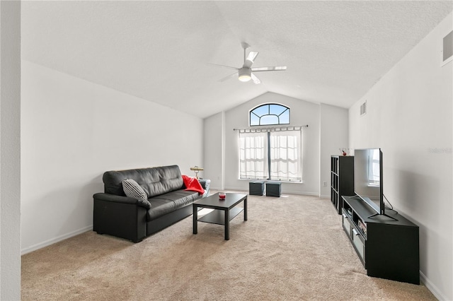 36711 Alaqua Ct, Eustis, FL 32736 - living room featuring a ceiling fan, lofted ceiling, carpet flooring, and baseboards