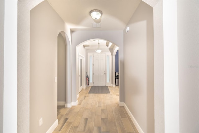 hallway featuring light hardwood / wood-style flooring