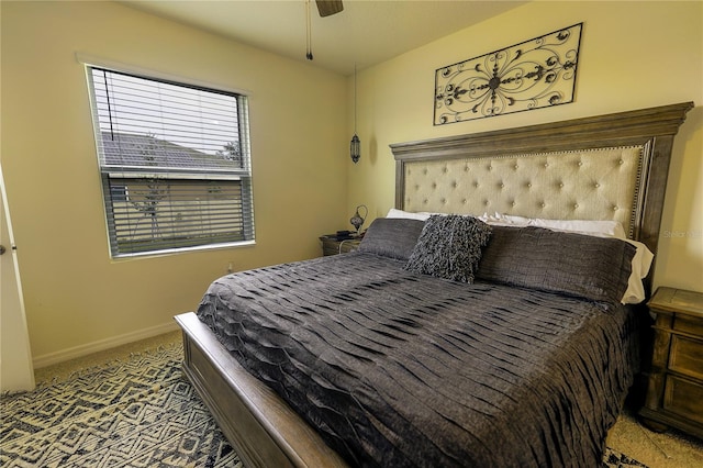 564 Boardwalk Ave, Haines City, FL 33844 - bedroom with carpet flooring, baseboards, and a ceiling fan