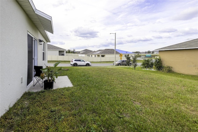 564 Boardwalk Ave, Haines City, FL 33844 - view of yard with a residential view