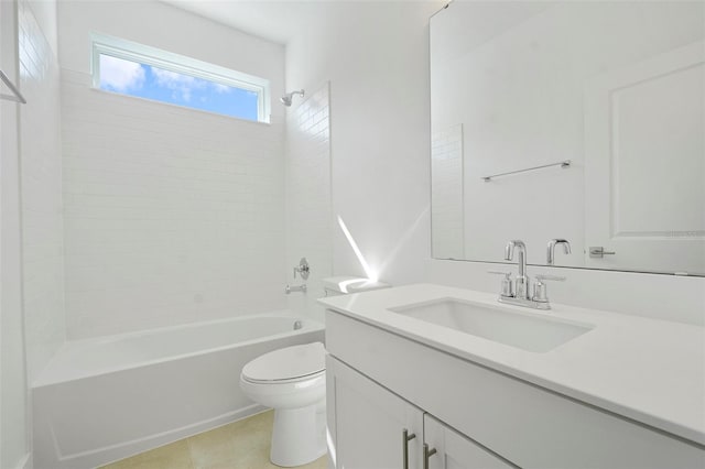 full bathroom with tiled shower / bath, vanity, tile patterned floors, and toilet