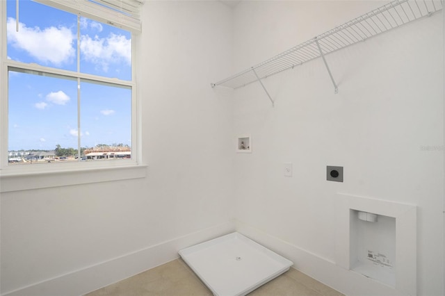 laundry room with hookup for a washing machine and hookup for an electric dryer