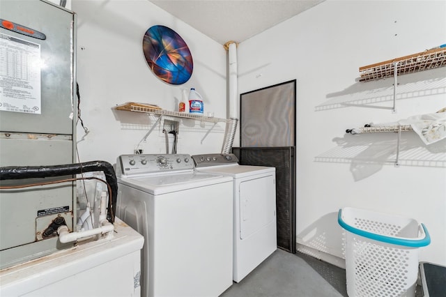 laundry room featuring independent washer and dryer