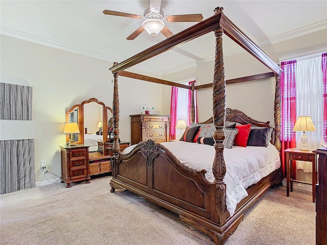 bedroom with ornamental molding, carpet, and ceiling fan