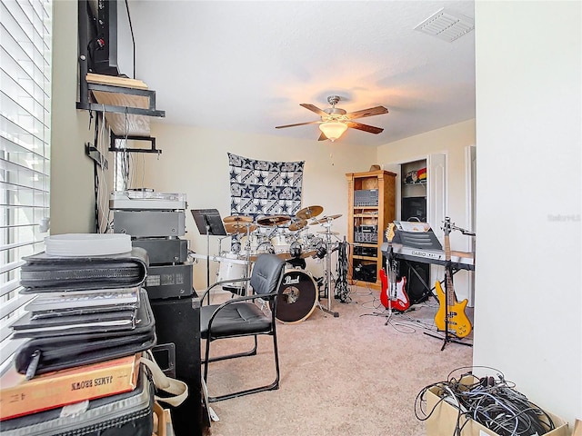 interior space featuring ceiling fan