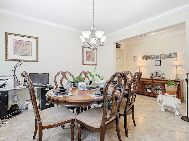 dining area featuring crown molding, a chandelier, and light tile patterned floors