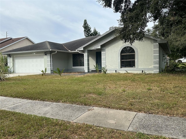 ranch-style house with a front lawn and a garage