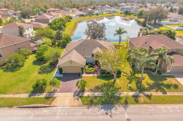 bird's eye view with a water view