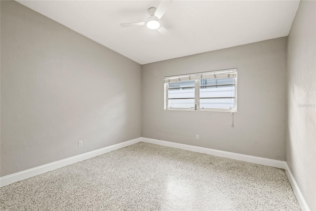 unfurnished room featuring ceiling fan