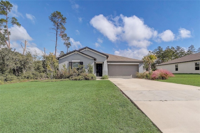 ranch-style home with a front yard and a garage