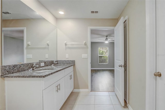 bathroom featuring vanity, ceiling fan, and tile patterned flooring